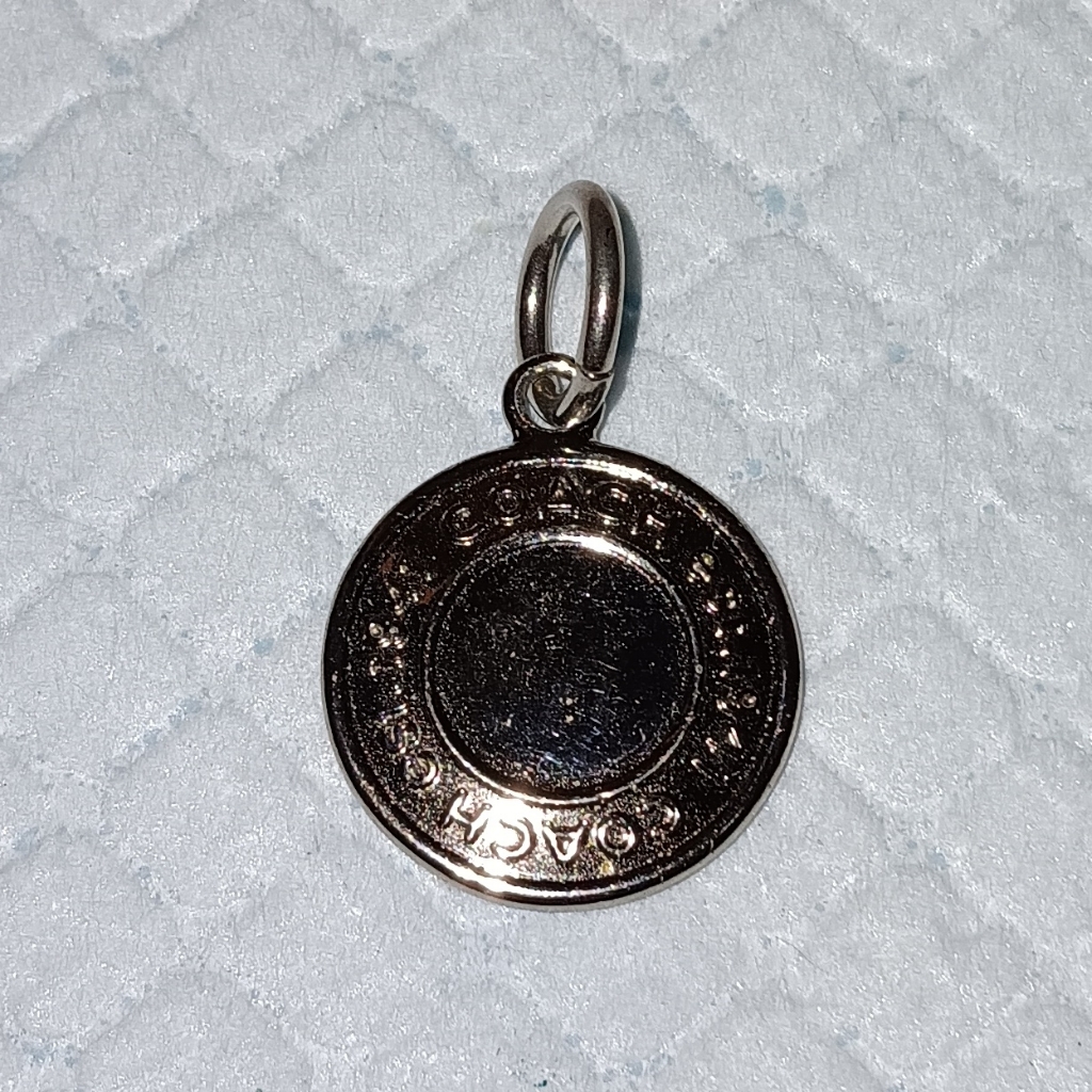 Coach Button Style Silver Tone Pendant 25$